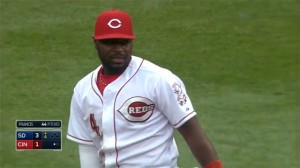 Brandon Phillips leaps and comes down with the baseball on a sharply-hit line drive off the bat of Jedd Gyorko.