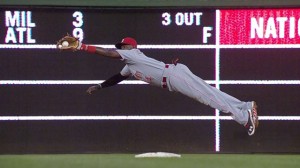 Brandon Phillips makes an excellent diving catch to rob Wilson Ramos of a game-winning hit up the middle in the 12th inning.