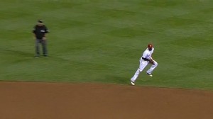 Brandon Phillips fields a ground ball, as his errorless streak reaches 100 games, a single-season club record for a second baseman.