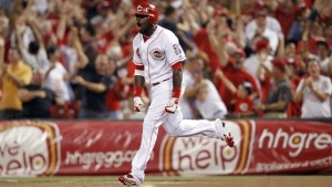 Brandon Phillips leads off the 13th inning with a home run to left field, giving the Reds a 5-4 lead.