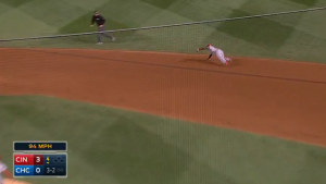 Brandon Phillips makes a great diving stop and completes the throw to first to take a hit away from Dexter Fowler.