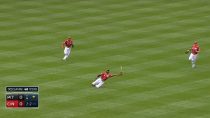 Brandon Phillips slips but still manages to catch a popup off the bat of Andrew McCutchen from his knees.