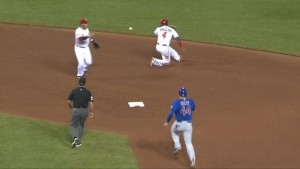 Brandon Phillips makes a slick behind-the-back toss to second base, where Eugenio Suarez snags the ball with his bare hand.