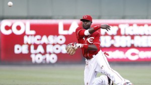 Brandon Phillips makes a diving stop on Jarrod Saltalamacchia's grounder, then throws to first to complete the play.